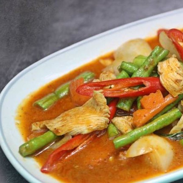 Stir fried chicken and red curry paste